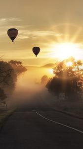 Preview wallpaper air balloons, road, fog, sunlight, sunset