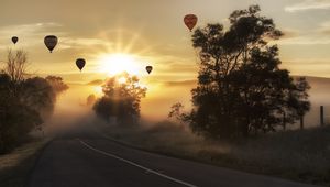 Preview wallpaper air balloons, road, fog, sunlight, sunset