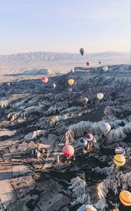 Preview wallpaper air balloons, rocks, flight, view from above, cappadocia, goreme