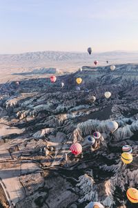 Preview wallpaper air balloons, rocks, flight, view from above, cappadocia, goreme