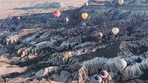 Preview wallpaper air balloons, rocks, flight, view from above, cappadocia, goreme