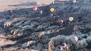 Preview wallpaper air balloons, rocks, flight, view from above, cappadocia, goreme