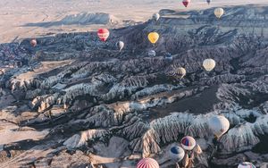 Preview wallpaper air balloons, rocks, flight, view from above, cappadocia, goreme