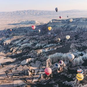 Preview wallpaper air balloons, rocks, flight, view from above, cappadocia, goreme