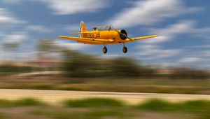 Preview wallpaper aircraft, old, yellow, flight, blur