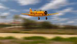 Preview wallpaper aircraft, old, yellow, flight, blur