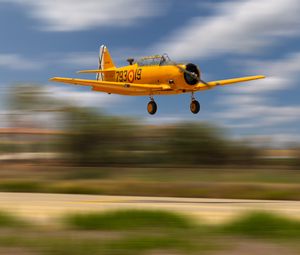 Preview wallpaper aircraft, old, yellow, flight, blur