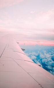 Preview wallpaper aircraft wing, clouds, flight, sky, porous