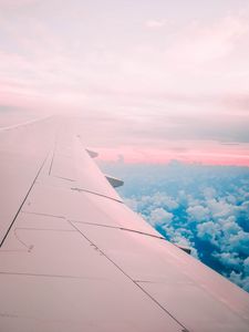 Preview wallpaper aircraft wing, clouds, flight, sky, porous