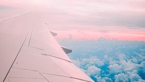 Preview wallpaper aircraft wing, clouds, flight, sky, porous