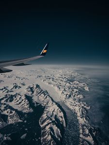 Preview wallpaper aircraft wing, flight, aerial view, mountains, snow