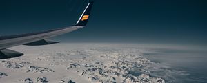 Preview wallpaper aircraft wing, flight, aerial view, mountains, snow