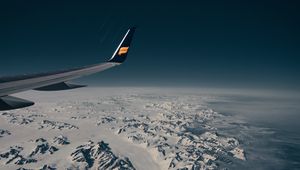 Preview wallpaper aircraft wing, flight, aerial view, mountains, snow