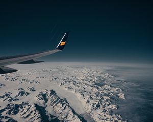 Preview wallpaper aircraft wing, flight, aerial view, mountains, snow