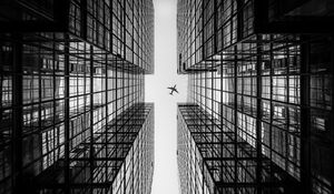 Preview wallpaper airplane, building, facade, bw, bottom view, hong kong