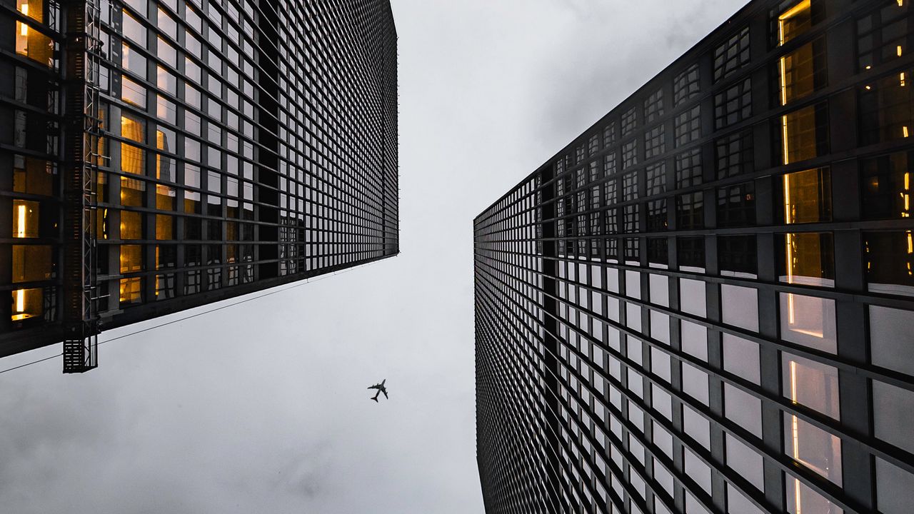 Wallpaper airplane, buildings, skyscrapers, bottom view