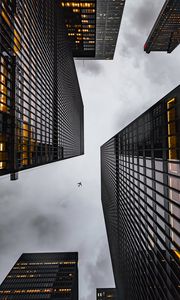 Preview wallpaper airplane, buildings, skyscrapers, bottom view