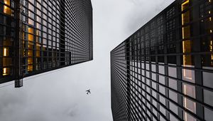 Preview wallpaper airplane, buildings, skyscrapers, bottom view