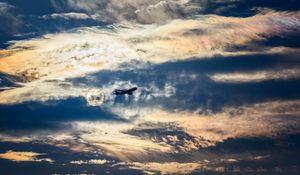 Preview wallpaper airplane, clouds, flight, sky, outlines