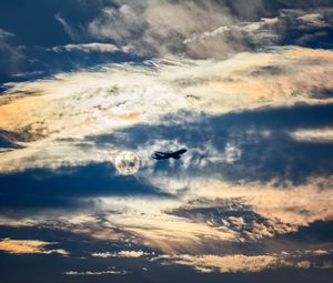 Preview wallpaper airplane, clouds, flight, sky, outlines