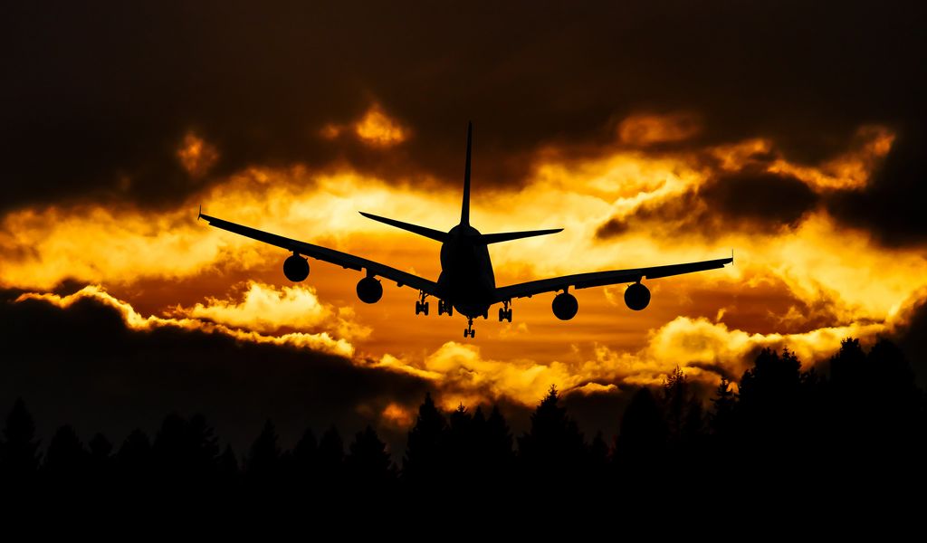 1024x600 Wallpaper airplane, clouds, sky, sunset
