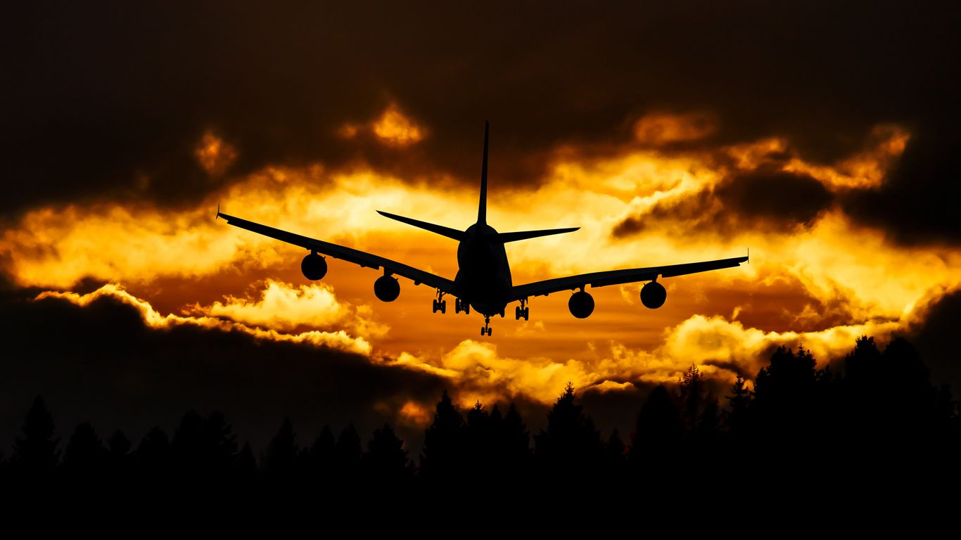 1366x768 Wallpaper airplane, clouds, sky, sunset