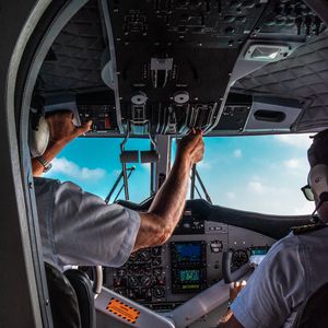 Preview wallpaper airplane, cockpit, pilots, control