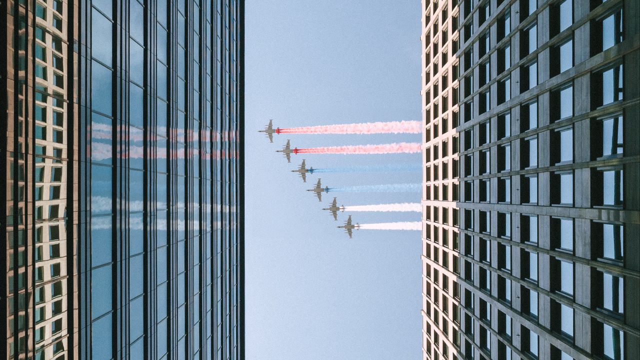 Wallpaper airplane, colored smoke, building