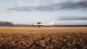 Preview wallpaper airplane, field, nature, landscape