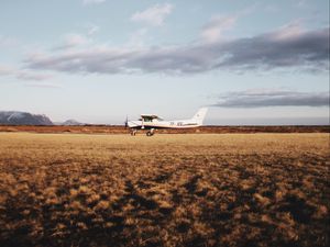 Preview wallpaper airplane, field, nature, landscape