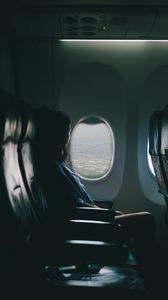 Preview wallpaper airplane, girl, flight, travel, porthole