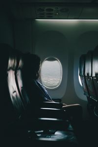 Preview wallpaper airplane, girl, flight, travel, porthole