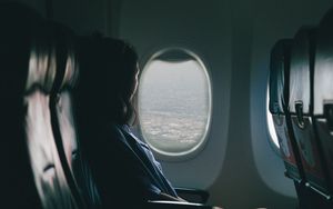 Preview wallpaper airplane, girl, flight, travel, porthole