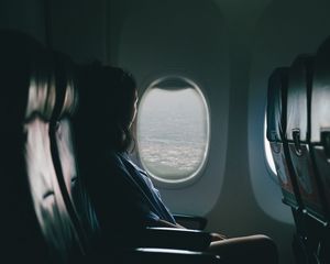 Preview wallpaper airplane, girl, flight, travel, porthole