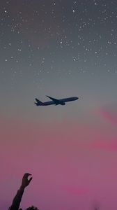 Preview wallpaper airplane, hand, sky, stars, flight, inspiration