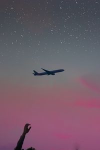 Preview wallpaper airplane, hand, sky, stars, flight, inspiration