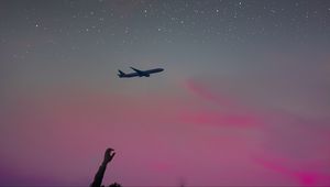 Preview wallpaper airplane, hand, sky, stars, flight, inspiration