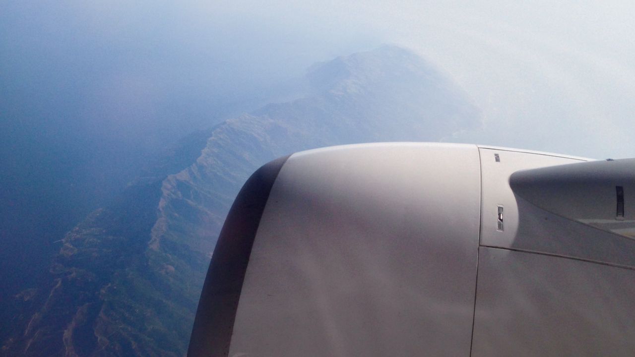 Wallpaper airplane, mountains, aerial view, starry sky