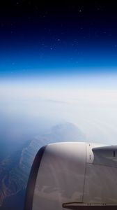 Preview wallpaper airplane, mountains, aerial view, starry sky