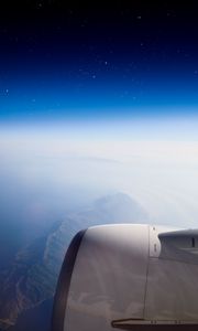 Preview wallpaper airplane, mountains, aerial view, starry sky
