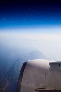 Preview wallpaper airplane, mountains, aerial view, starry sky