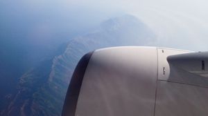 Preview wallpaper airplane, mountains, aerial view, starry sky