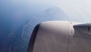 Preview wallpaper airplane, mountains, aerial view, starry sky