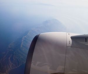 Preview wallpaper airplane, mountains, aerial view, starry sky