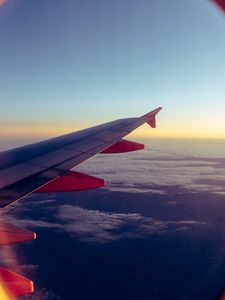 Preview wallpaper airplane, porthole, wing, clouds, overview