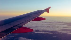 Preview wallpaper airplane, porthole, wing, clouds, overview