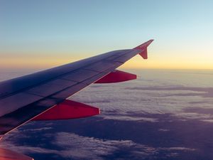 Preview wallpaper airplane, porthole, wing, clouds, overview