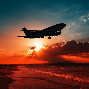 Preview wallpaper airplane, sea, sunset, takeoff, silhouette, sky