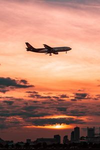 Preview wallpaper airplane, sky, flight, clouds, sunset