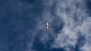 Preview wallpaper airplane, sky, flight, clouds, bottom view